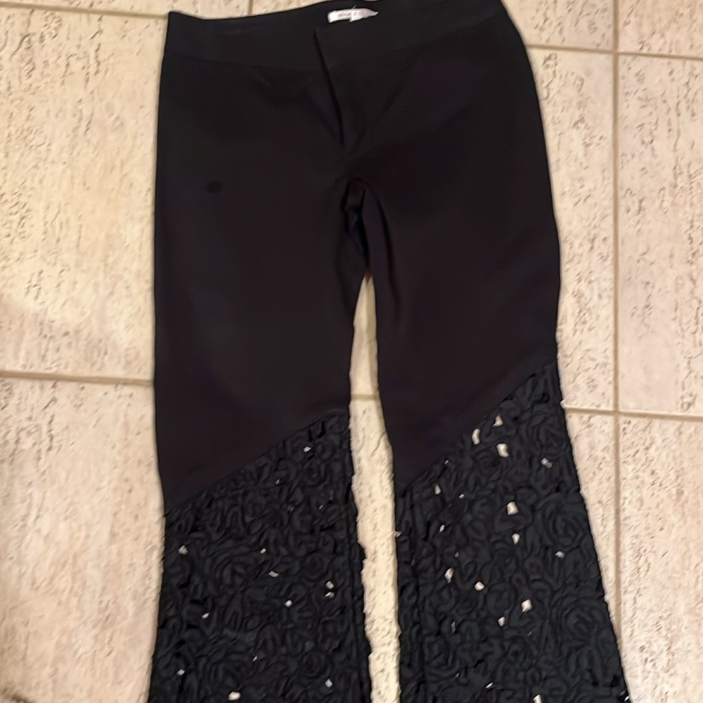 Alice & Olivia black cutout flare pants. Beautiful stylish and timeless. - Picture 4 of 5